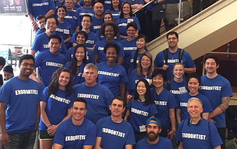 Team members in matching shirts at community event