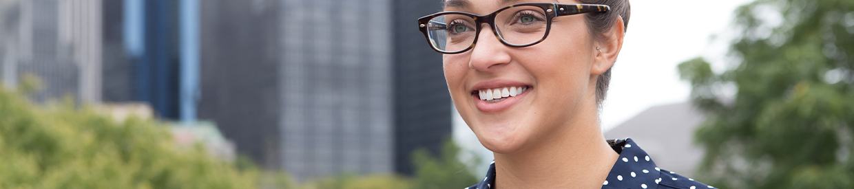 Woman sharing flawless smile outdoors