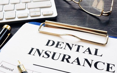 dental insurance form on table 