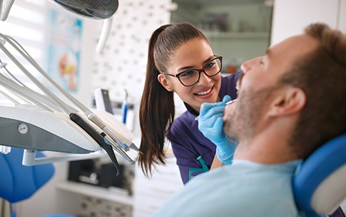 Man receiving dental exam