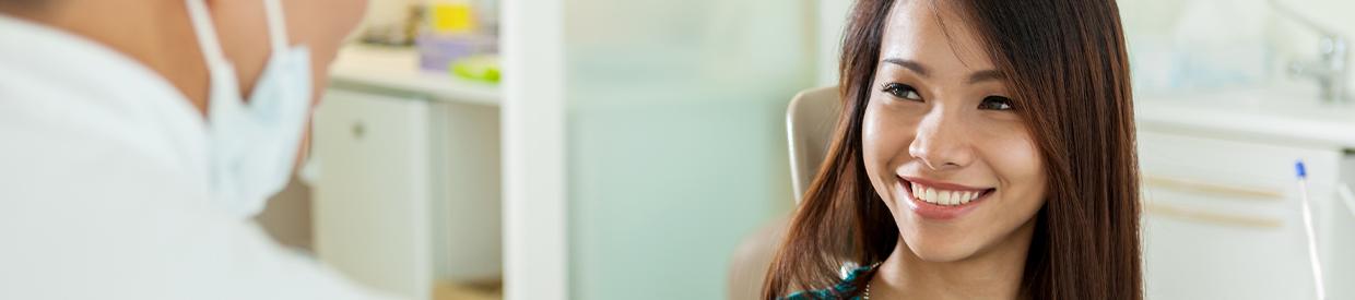 Woman smiling at dentist