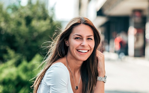 patient smiling after getting veneers in Conway