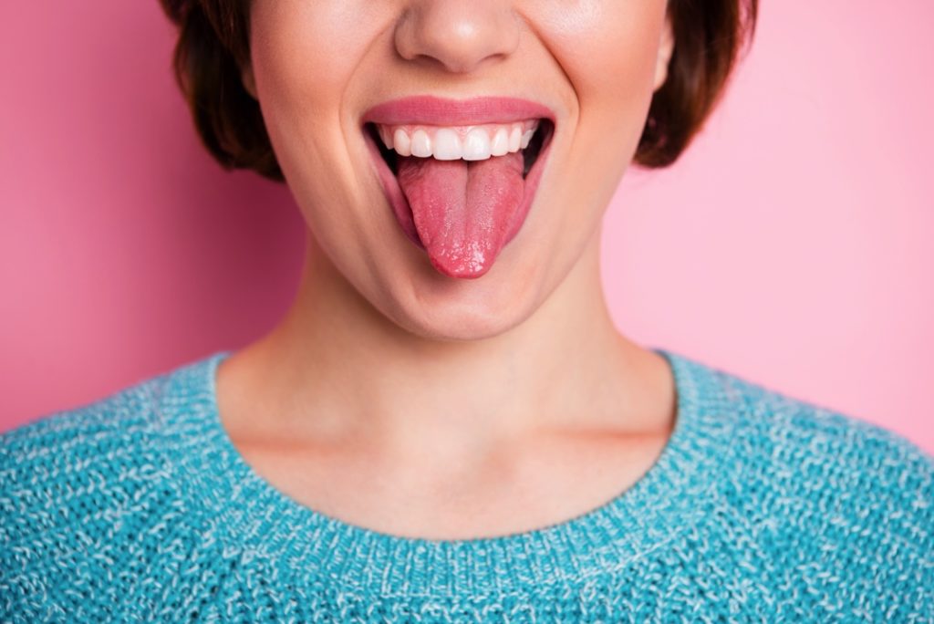 Woman sticking out her tongue