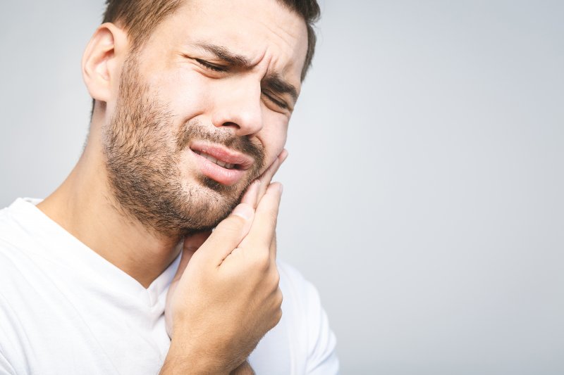 Man with dental emergency