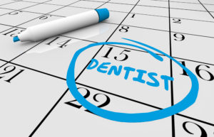 Dental checkup reminder circled on calendar