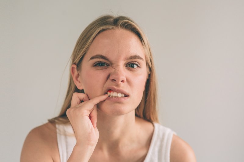 Woman with bump on gums